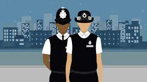 alt="two police officers"