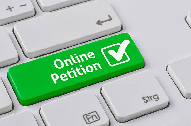 alt="keyboard & online petition notice"